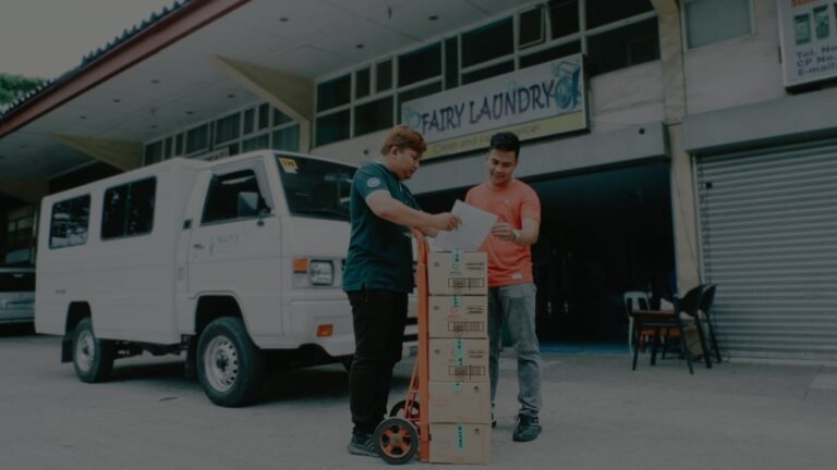 Mazy's staff delivering P&G laundry supplies to a business customer
