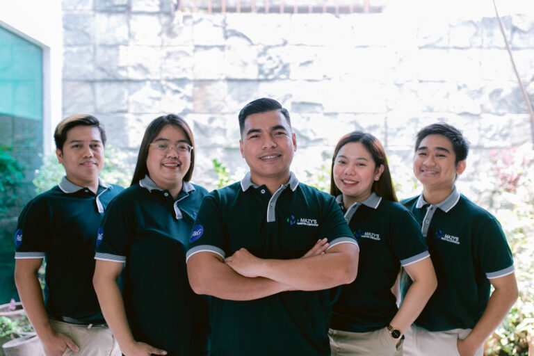 Mazy's Marketing Corporation sales team in company uniforms